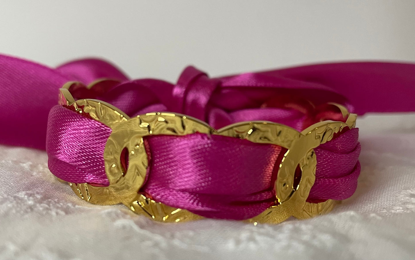 Bracelet acier inoxydable ruban fuchsia 