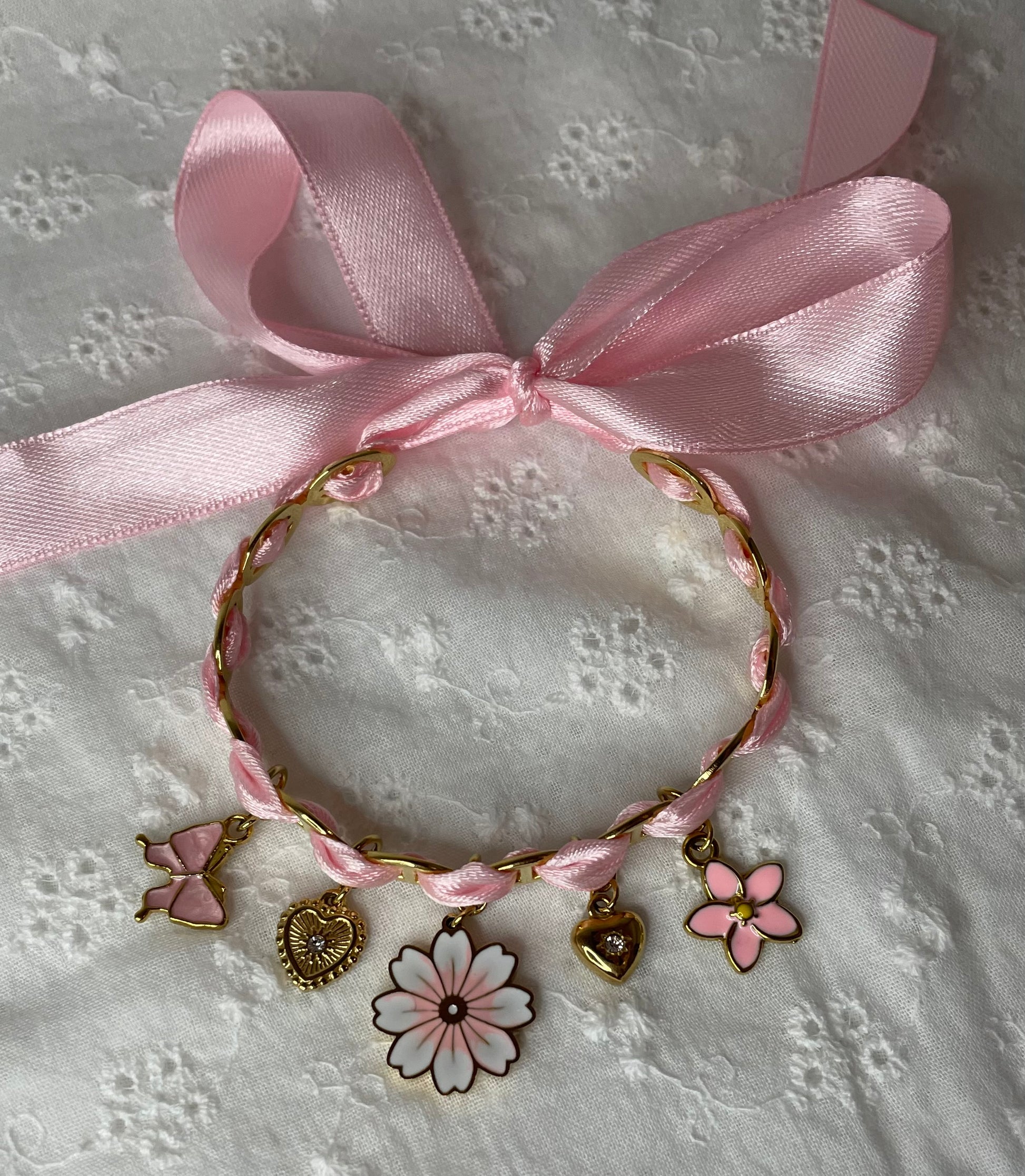 Bracelet breloques fleur et coeur